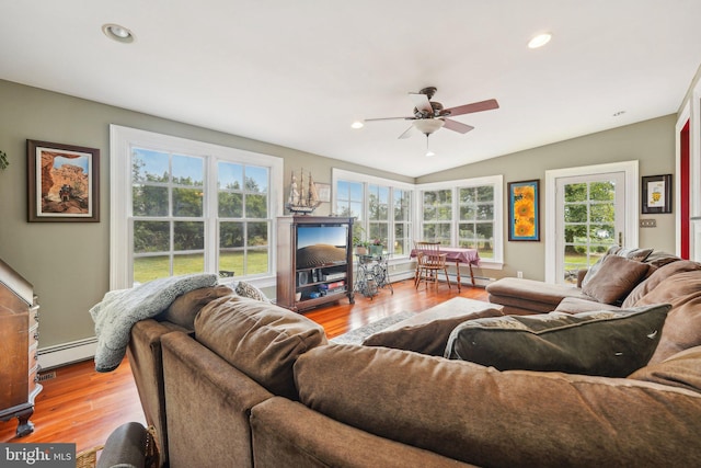 living room featuring ceiling fan, recessed lighting, wood finished floors, lofted ceiling, and a baseboard radiator