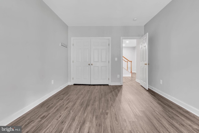 empty room featuring hardwood / wood-style flooring