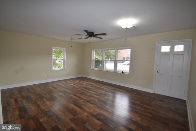 104 School Ln, Georgetown, DE 19947 - interior space with baseboards, ceiling fan, and dark wood-type flooring