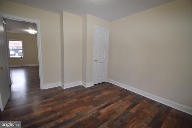 104 School Ln, Georgetown, DE 19947 - unfurnished room with baseboards and dark wood-type flooring