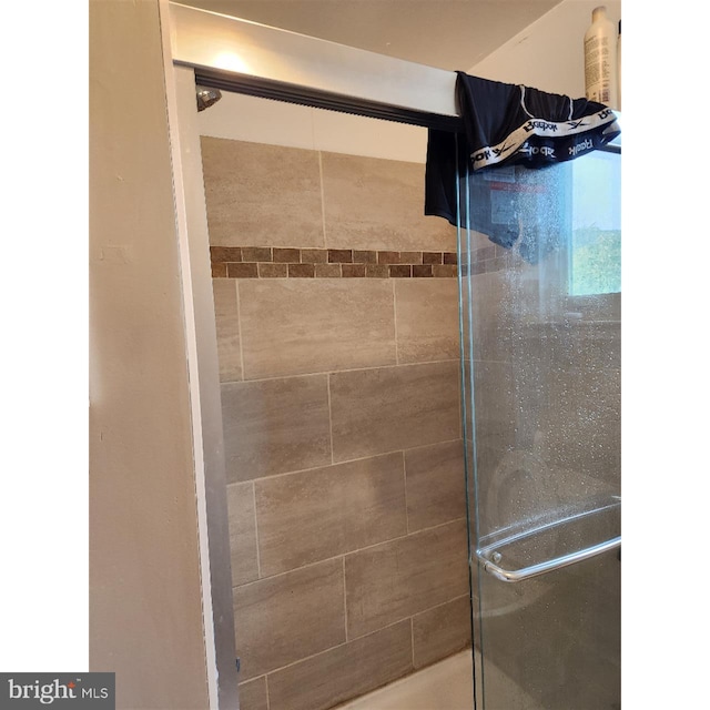 bathroom with walk in shower