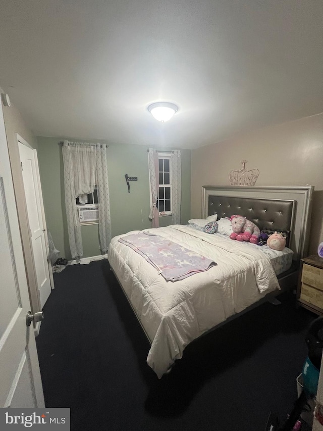 carpeted bedroom featuring cooling unit