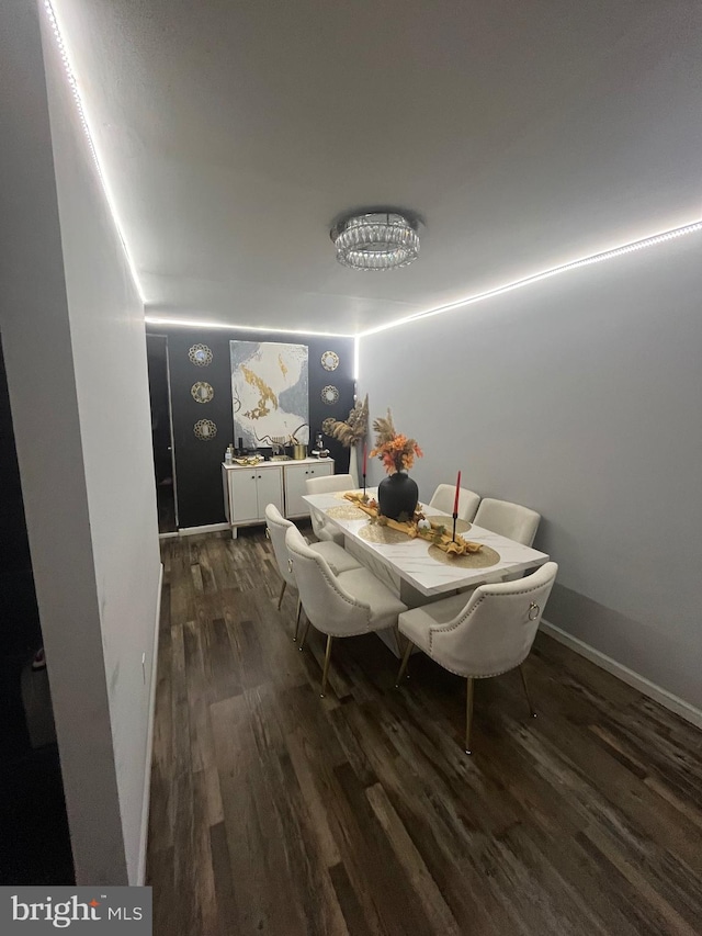 dining room with dark wood-type flooring