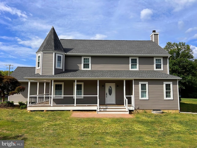 view of front of house featuring covered porch, a shingled roof, a chimney, and a front lawn