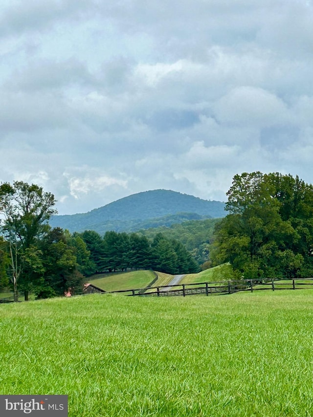 mountain view featuring a rural view