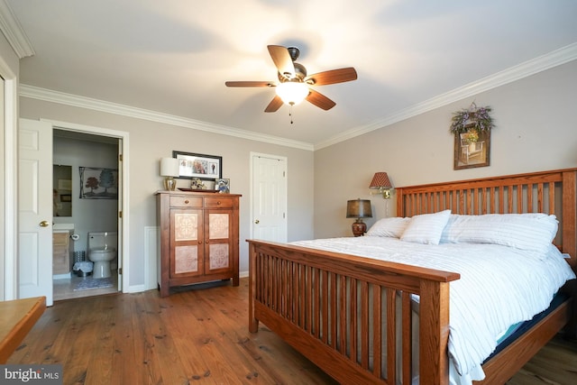 bedroom featuring ensuite bathroom, crown molding, ceiling fan, and dark hardwood / wood-style floors