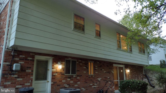 view of home's exterior featuring cooling unit