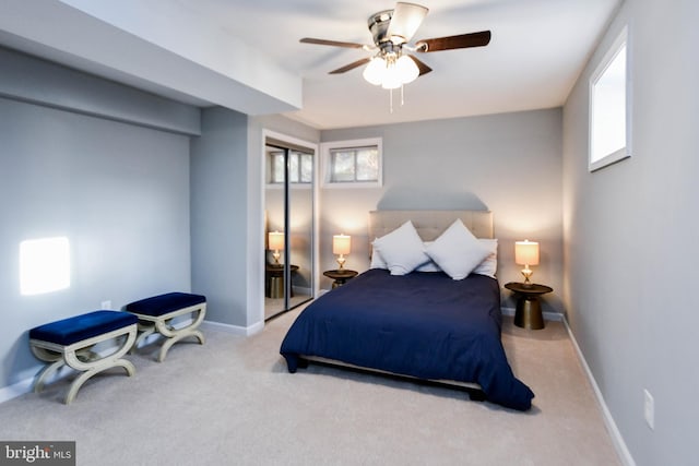 carpeted bedroom with ceiling fan