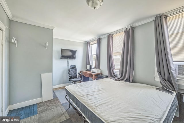 carpeted bedroom featuring ornamental molding