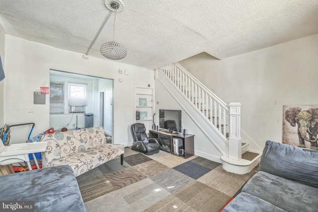 living room featuring a textured ceiling