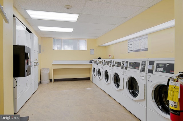 laundry room with washing machine and clothes dryer