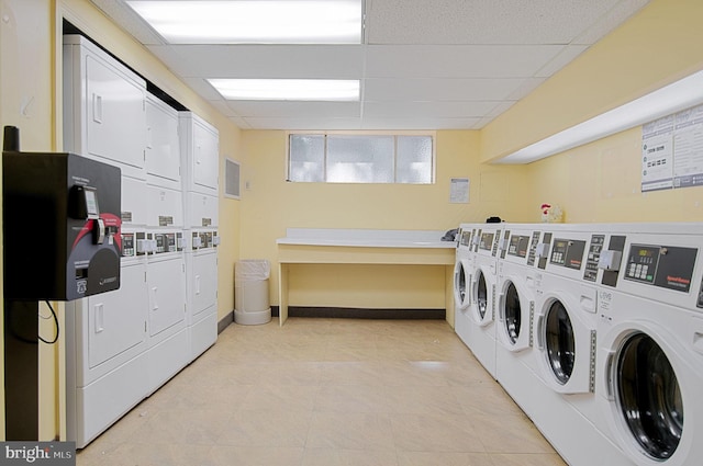 clothes washing area with stacked washer / drying machine and separate washer and dryer