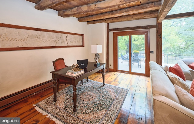 office area with wood ceiling, beam ceiling, baseboard heating, and hardwood / wood-style floors