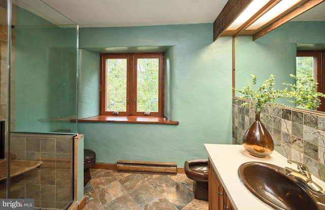 bathroom featuring walk in shower, vanity, a baseboard radiator, and toilet