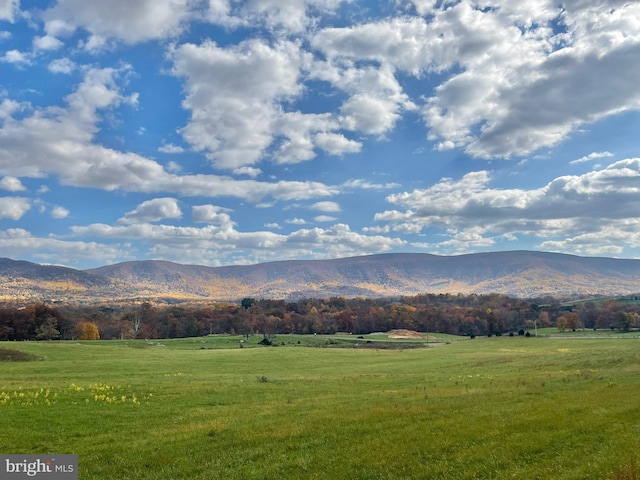 property view of mountains featuring a rural view