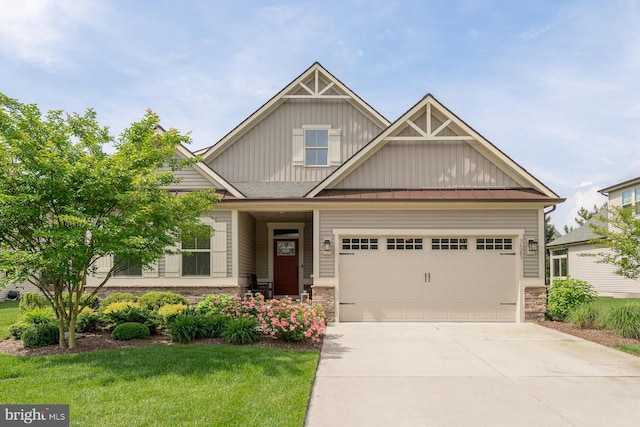 craftsman-style home with a front yard