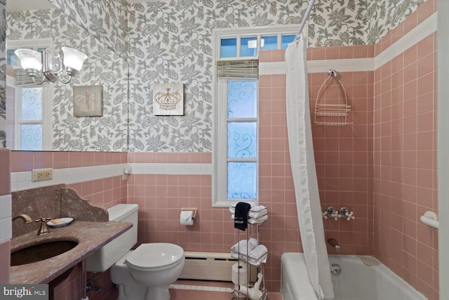 full bathroom featuring shower / bath combo with shower curtain, sink, tile walls, toilet, and plenty of natural light