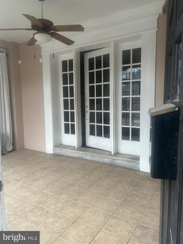 view of patio featuring ceiling fan