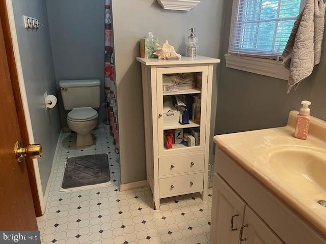 bathroom with vanity and toilet