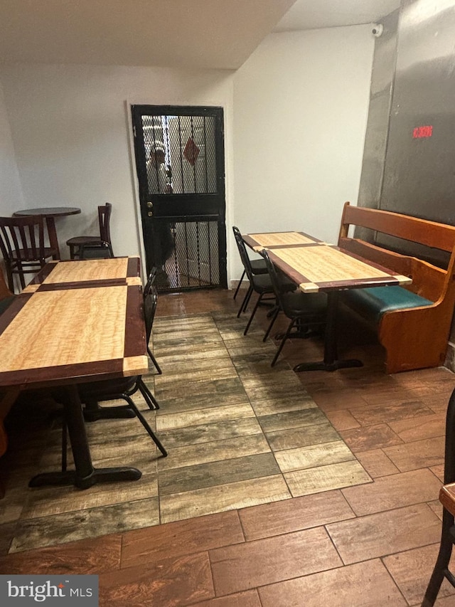 dining room featuring dark hardwood / wood-style flooring