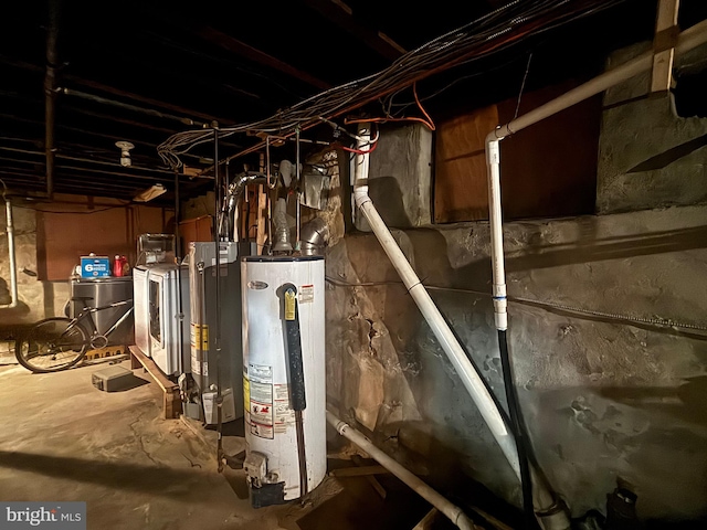 utility room featuring water heater