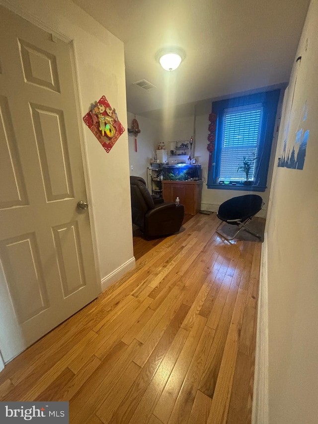 corridor featuring light hardwood / wood-style flooring