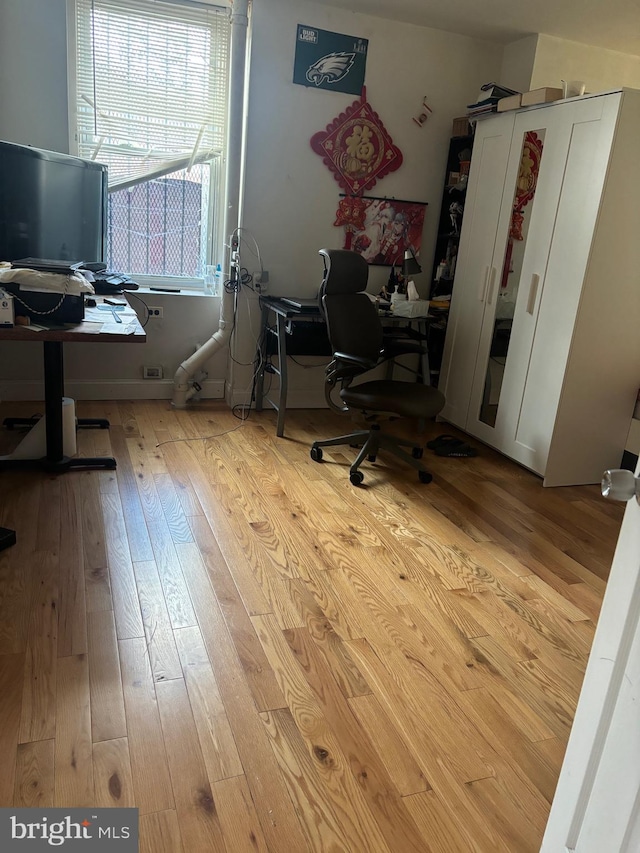 home office featuring light wood-type flooring