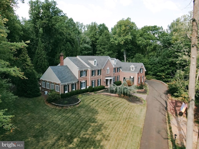 exterior space featuring a front yard