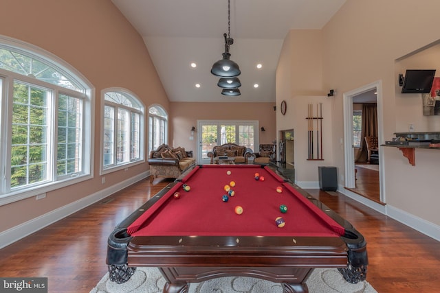 game room featuring high vaulted ceiling, dark hardwood / wood-style floors, and billiards