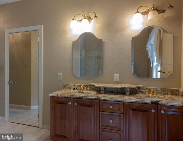 bathroom with vanity and tile patterned floors