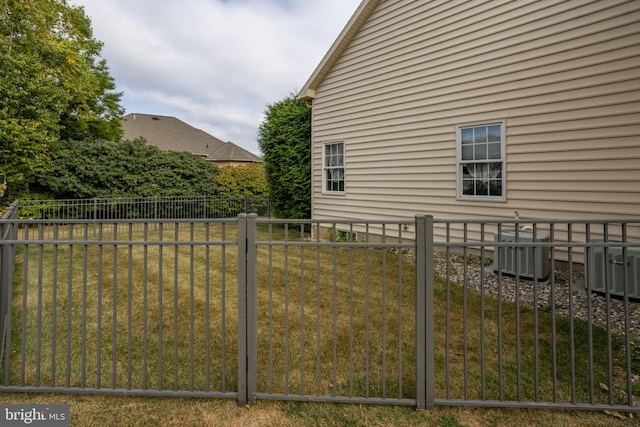 view of yard featuring central AC unit