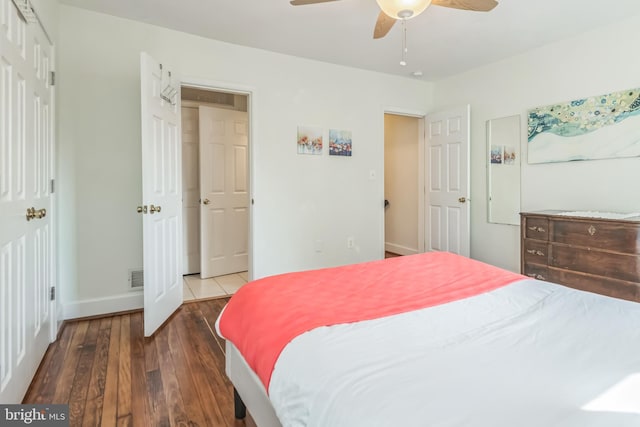 bedroom featuring wood-type flooring and ceiling fan