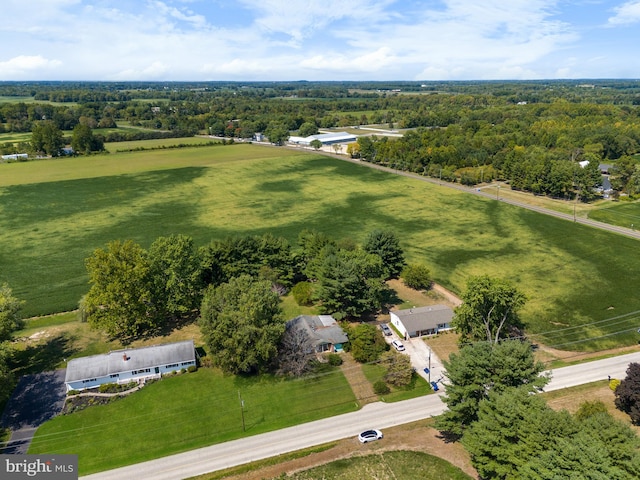 birds eye view of property featuring a rural view