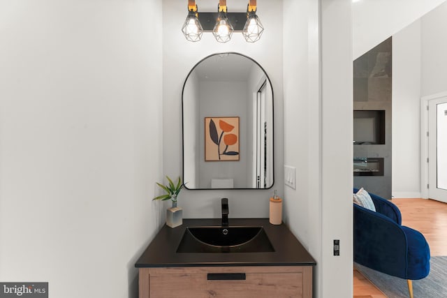 bathroom featuring vanity and hardwood / wood-style floors