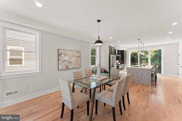 dining area featuring light hardwood / wood-style floors