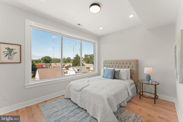 bedroom with light wood-type flooring