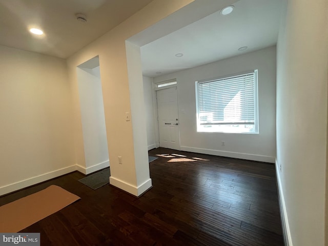 entrance foyer with dark hardwood / wood-style flooring