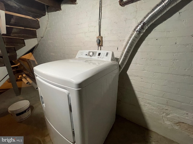 washroom with washer / clothes dryer