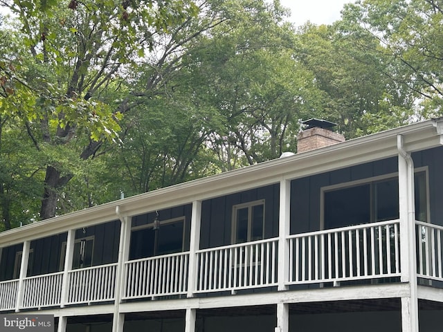 view of home's exterior with a balcony