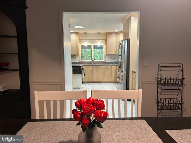 dining room featuring sink