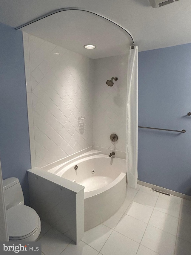 bathroom featuring shower / tub combo, tile patterned floors, and toilet