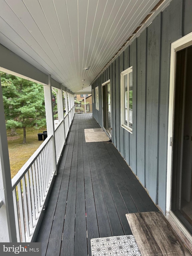 wooden deck with a porch