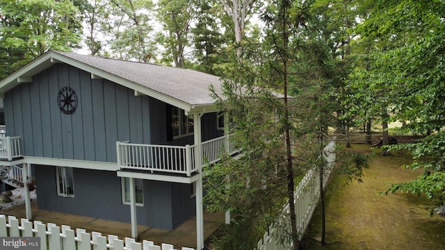 view of home's exterior featuring a balcony