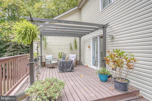 wooden terrace featuring a pergola