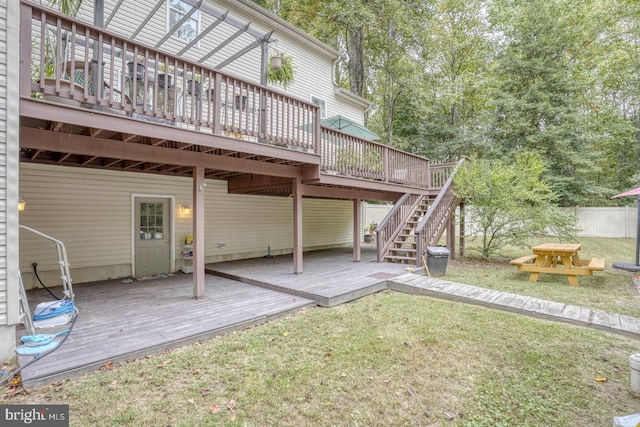 view of yard featuring a wooden deck