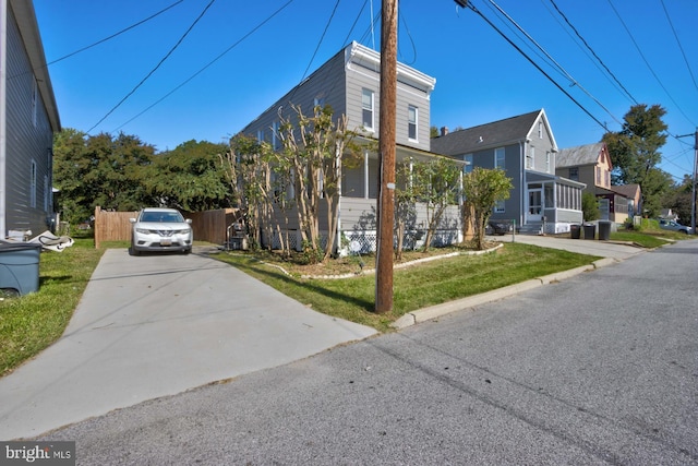 view of property exterior featuring a yard