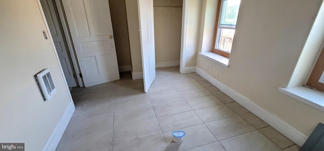 unfurnished bedroom featuring light tile patterned floors