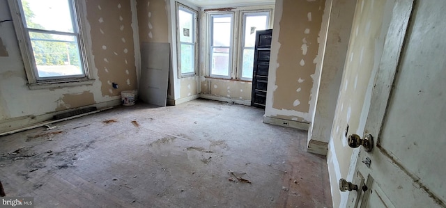 spare room featuring a wealth of natural light