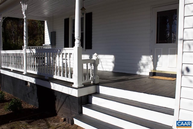 wooden deck featuring covered porch