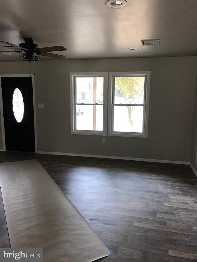 entryway with ceiling fan and dark hardwood / wood-style floors